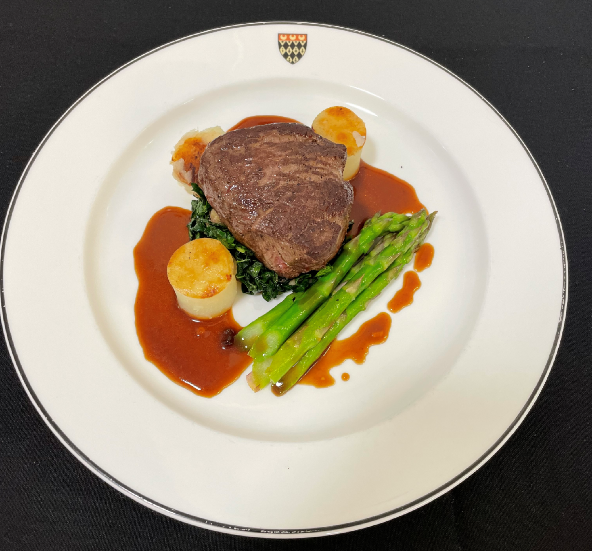 Fillet of beef (£10 supplement) on a bed of chestnut and spinach served with potato fondant, asparagus and port jus