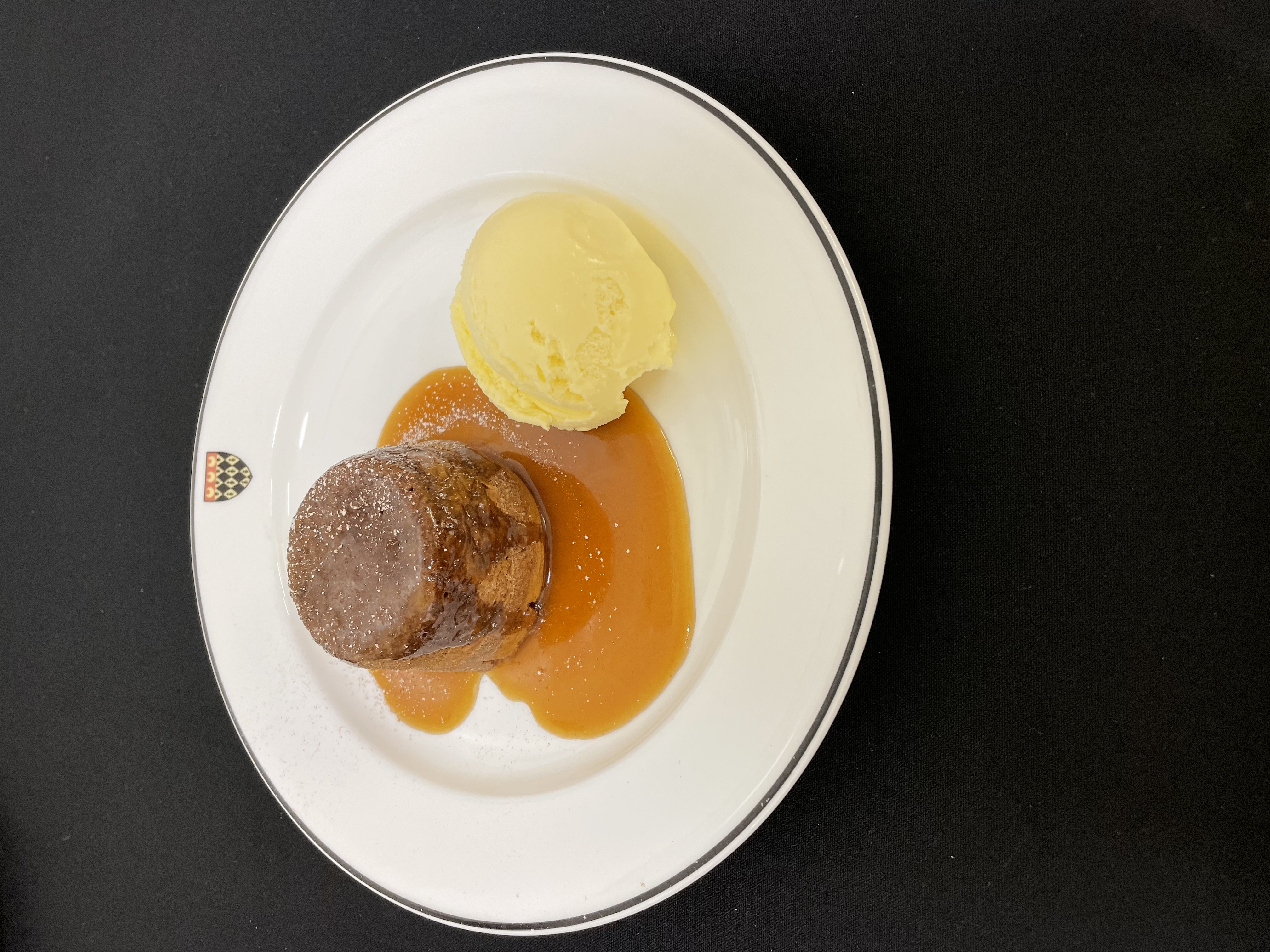 Sticky toffee pudding served with Madagascan vanilla ice cream and honeycomb