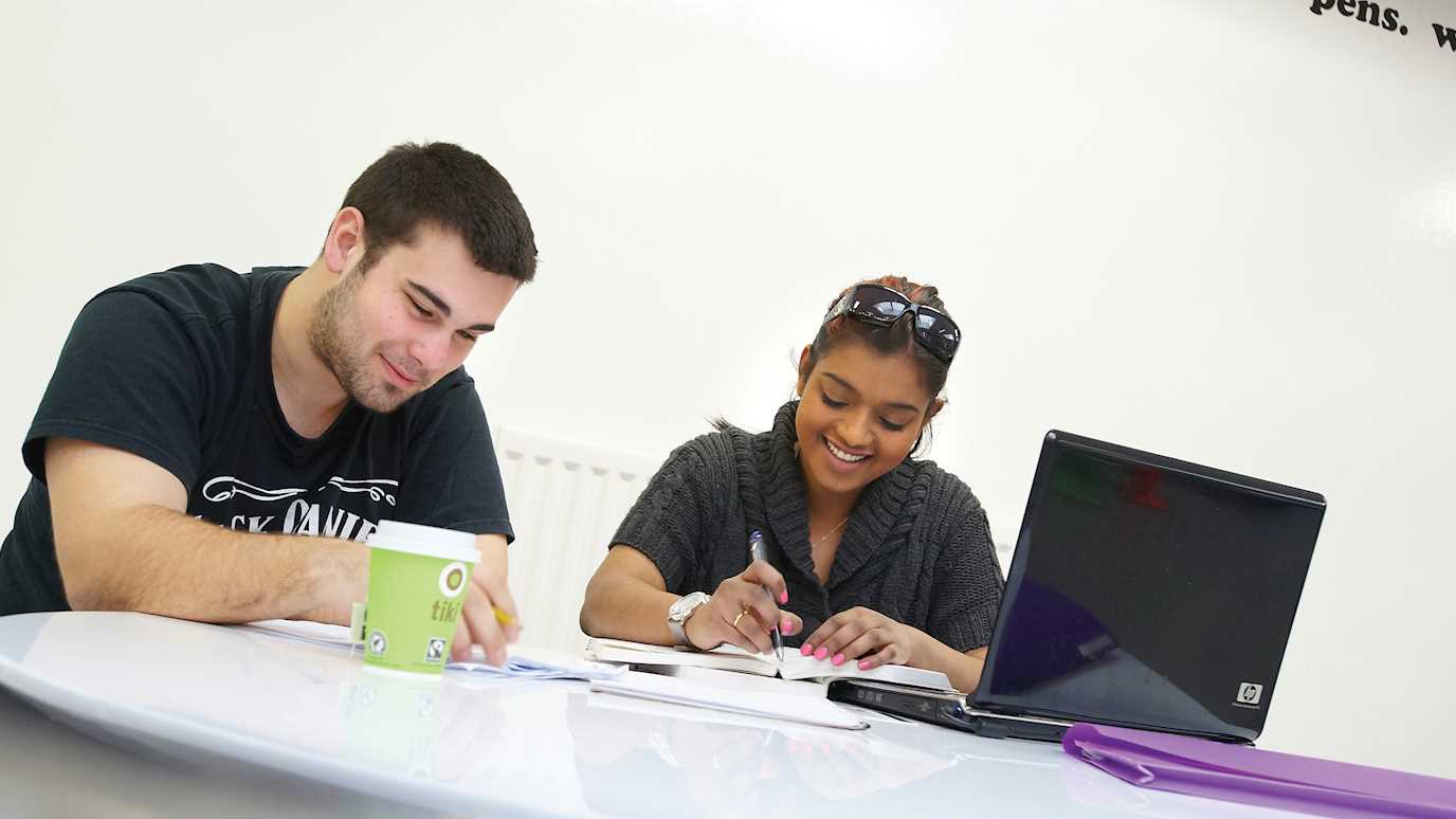 students with a whiteboard