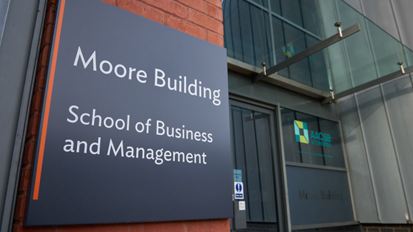 School of Business and Management sign Moore Building - SBM 130225