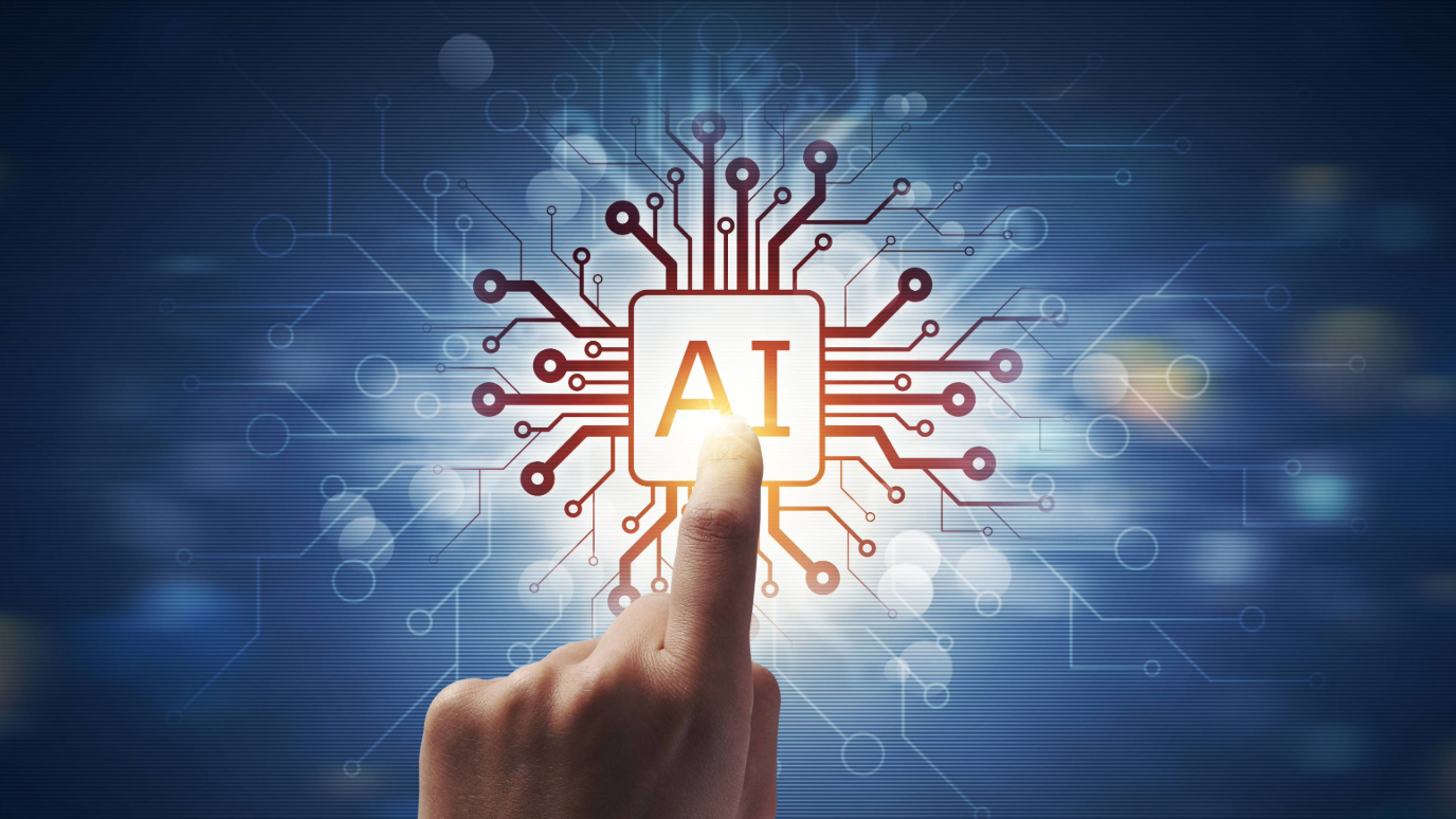 A finger pressing an AI button in the centre of a technical motherboard style graphic